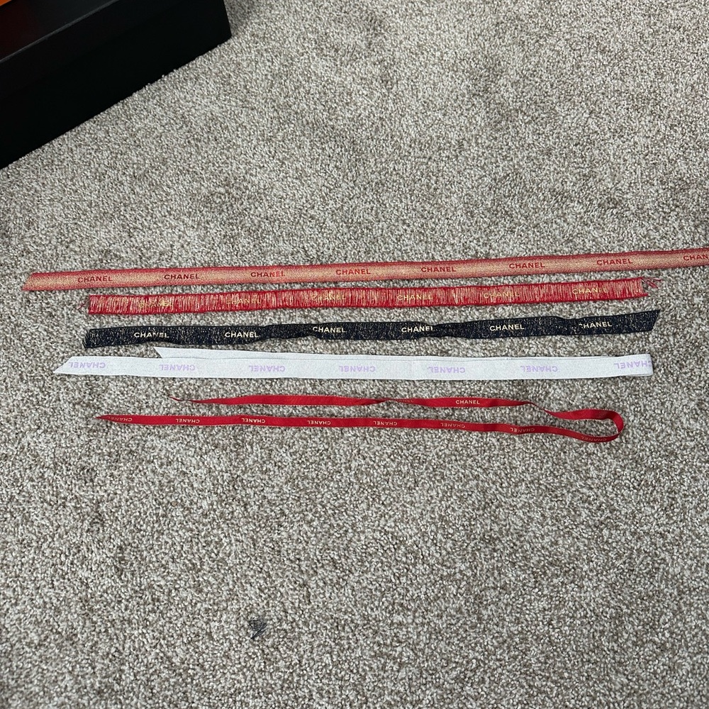 Chanel Ribbon Set in Red, Black, and White, each more than 21”.